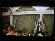Here is a full view. This scene goes by very fast but there it is, clear as day.